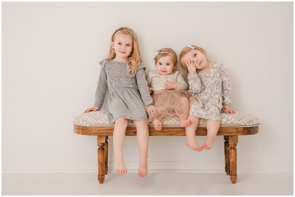 Three sisters at a photo shoot
